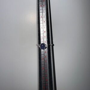 Elegant Silver Ring with Purple Stone